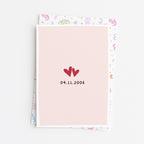 Close up of anniversary love date greeting card front design with envelope background